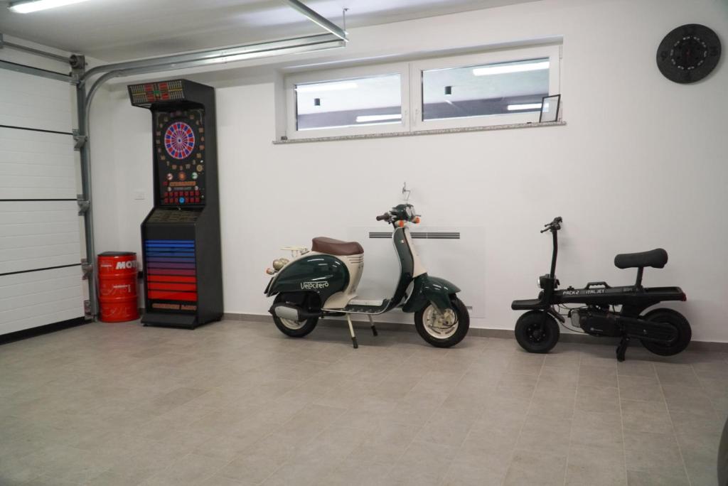 Indoor play area with darts and family equipment