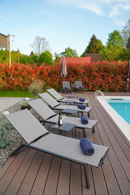 Prepared sun loungers beside the pool