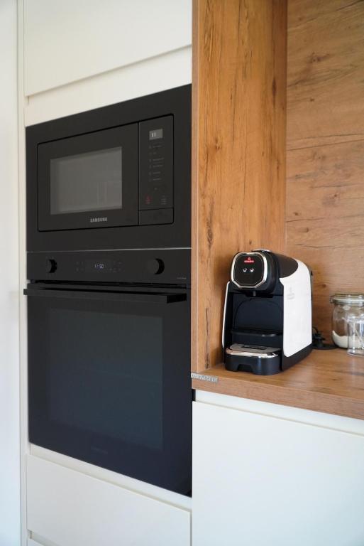 Coffee station built into the kitchen cabinetry