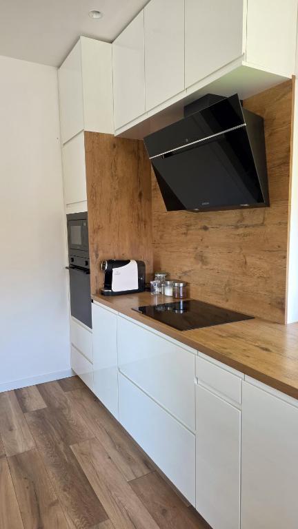 Kitchen worktop with coffee machine and hob