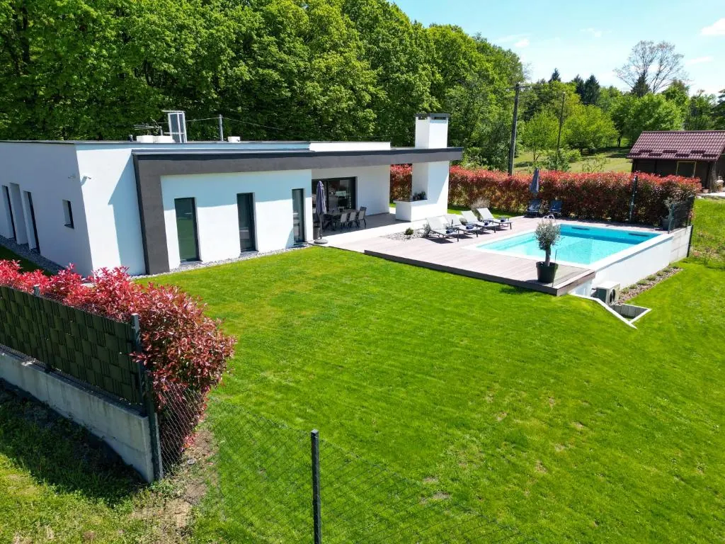 Aerial view of Villa Tomaté and its green countryside setting near Zagreb