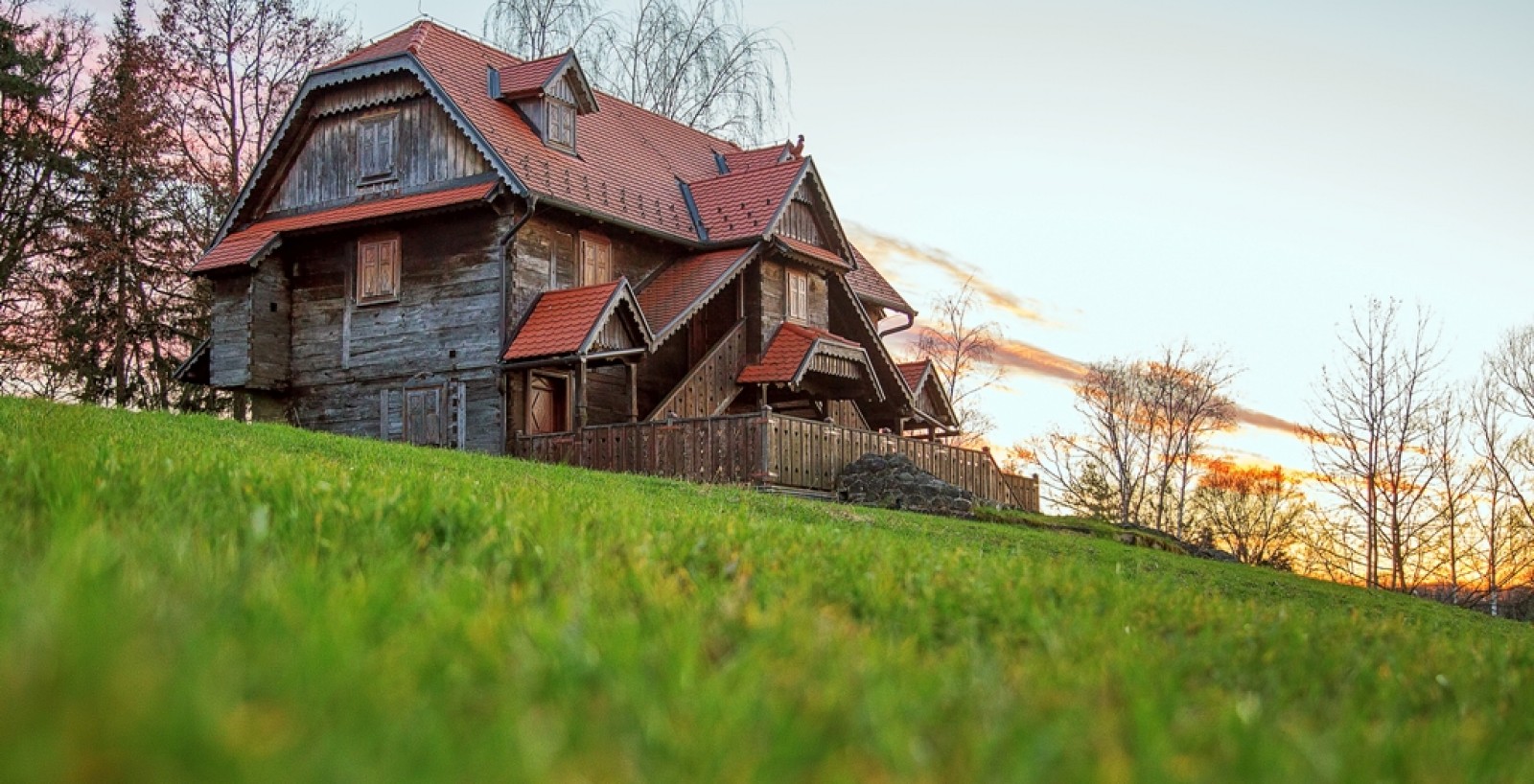 Traditional wooden Turopolje house on a green hillside